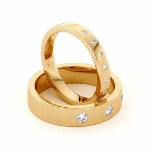 סט טבעות נישואין משובצות יהלומים לזוג בעיצוב אלגנטי